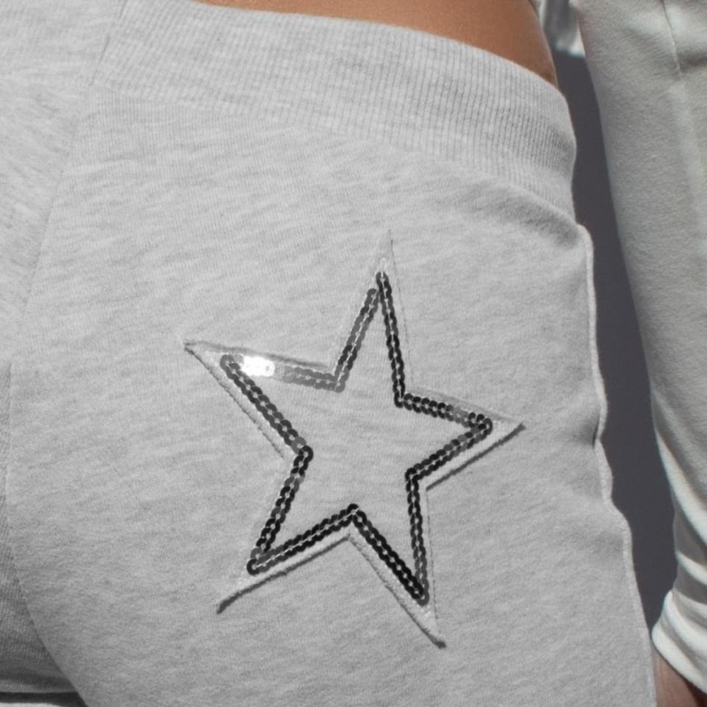Subdued joggers with sequin star size 2
